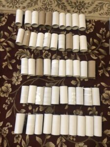 A table with many rolls of toilet paper on it