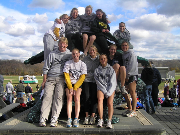 A group of people standing on top of each other.