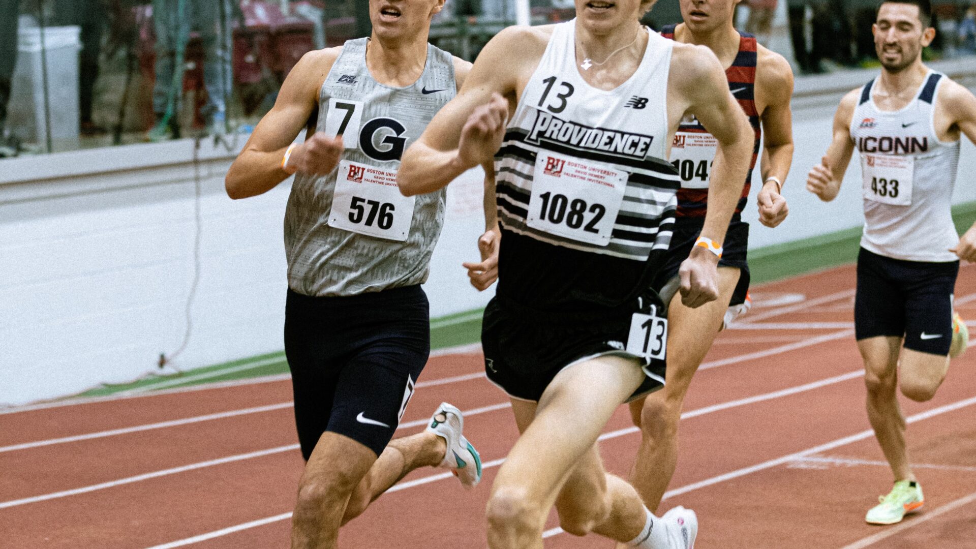 A group of men running on a track