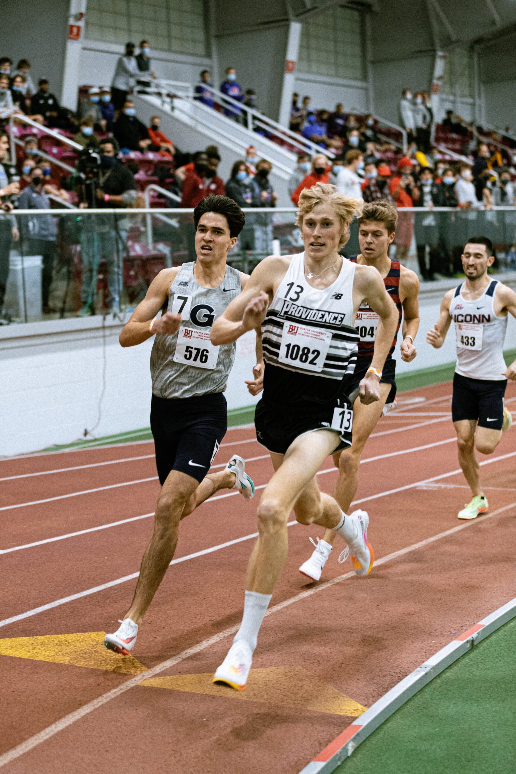 A group of men running on a track