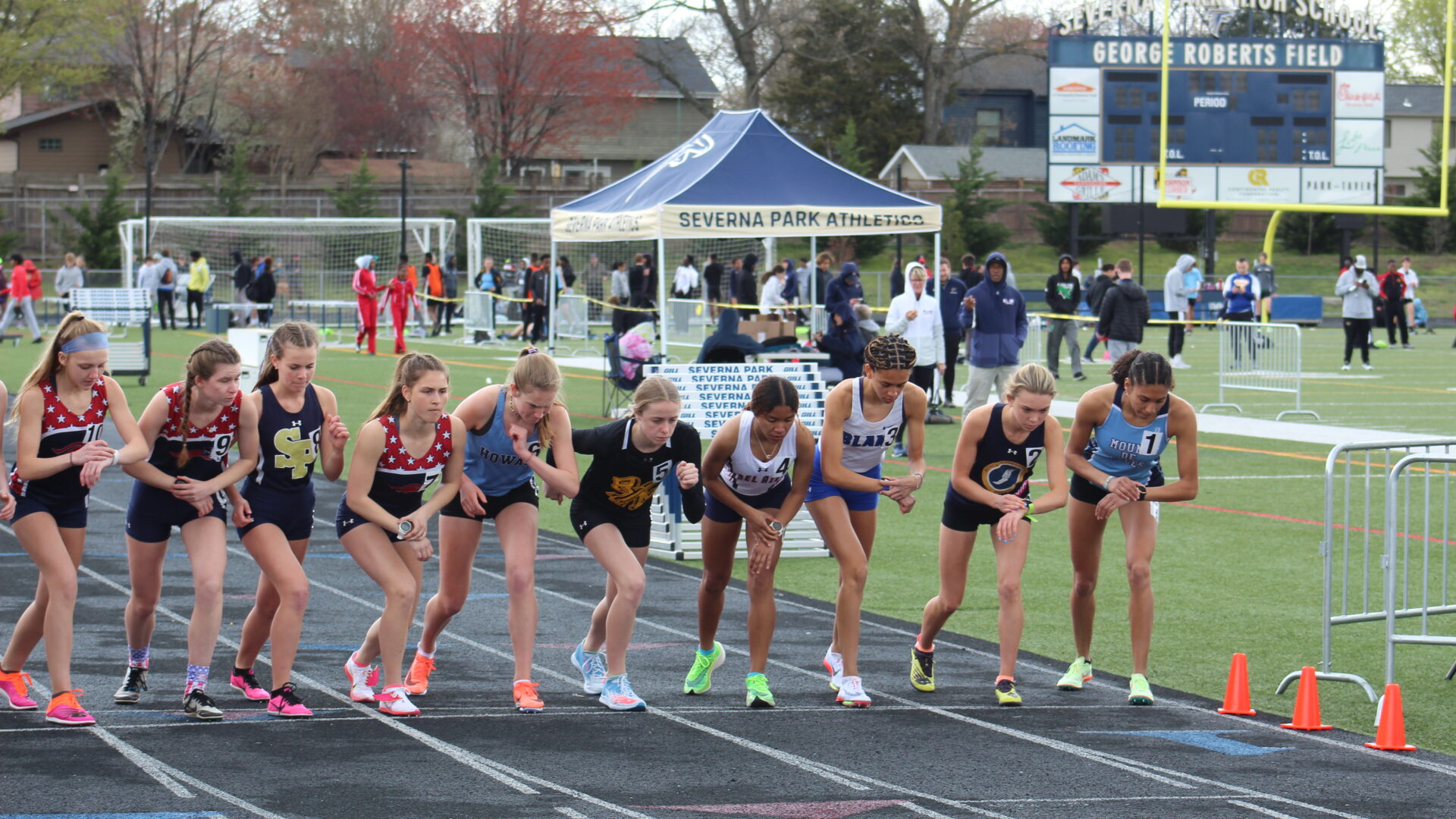 A group of girls running on the track