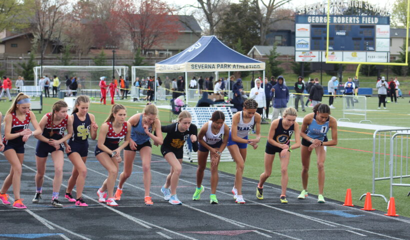 A group of girls running on the track