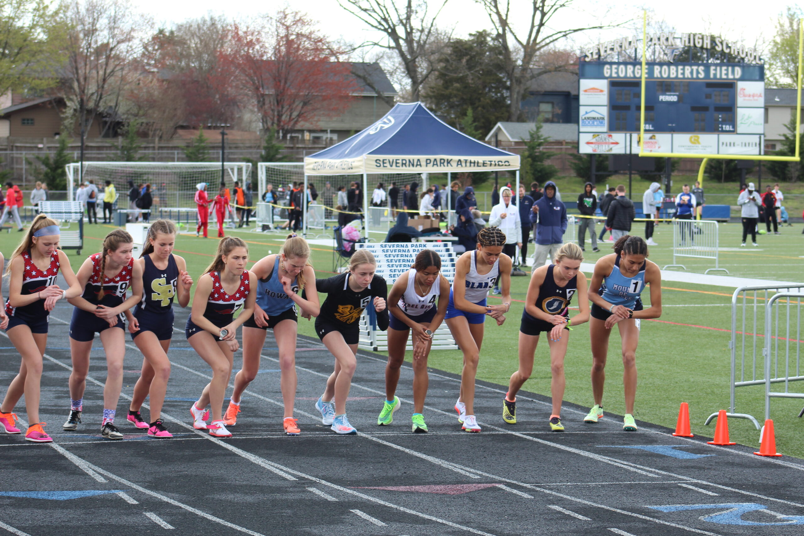 A group of girls running on the track