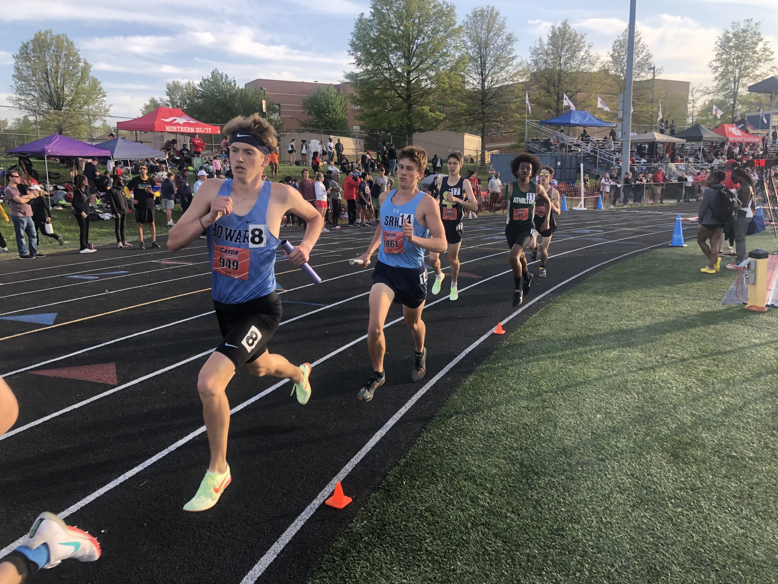 A group of people running on a track