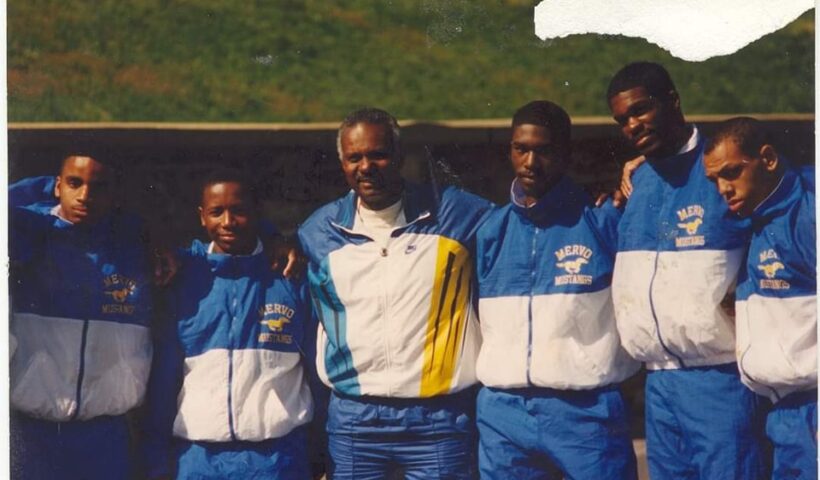 A group of young men standing next to each other.