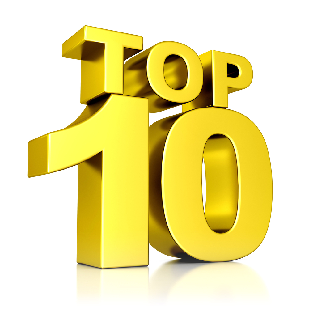 A gold top ten sign with the word " top 1 0 ".